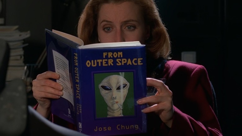 Scully reads From Outer Space