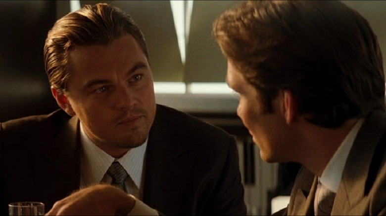 Leonardo DiCaprio talking to Cillian Murphy