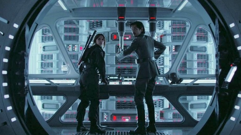 Jyn and Andor standing together