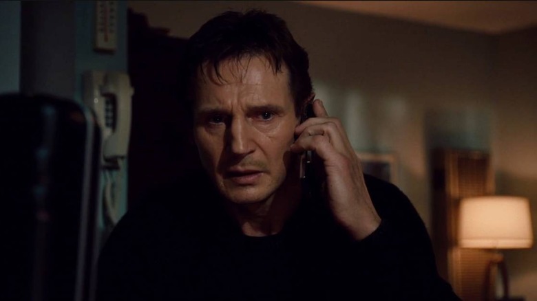 Liam Neeson on phone