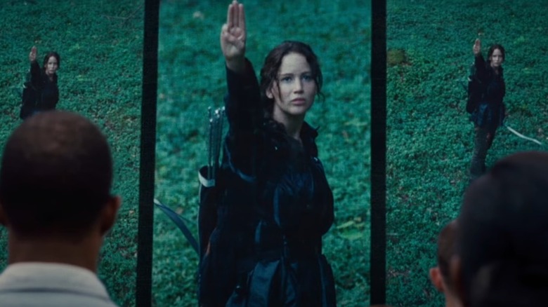 Katniss saluting on screen