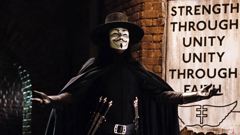 V appears in an alley in "V for Vendetta" (2006)