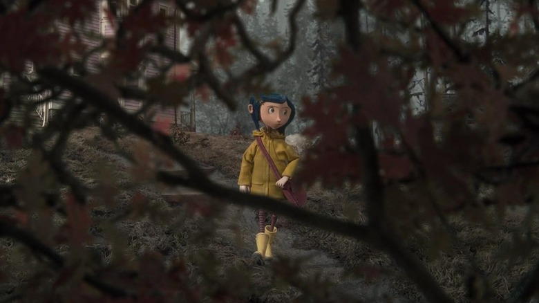 Coraline walking through forest