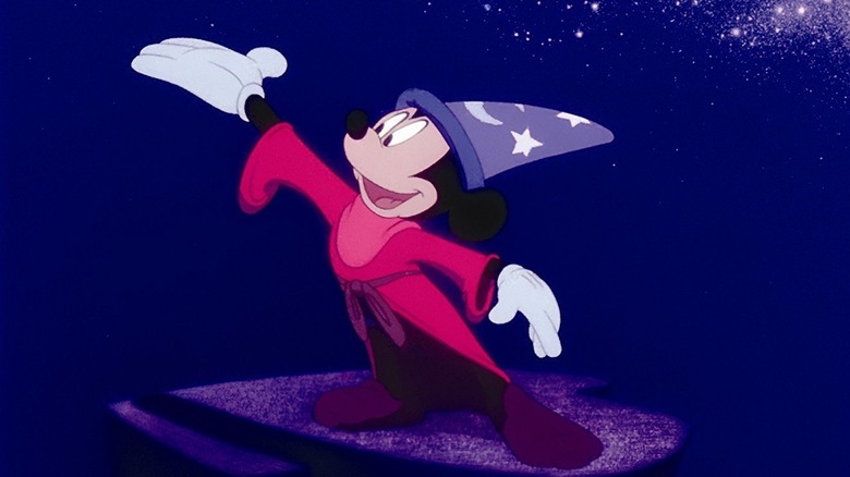 Mickey Mouse wearing wizard hat