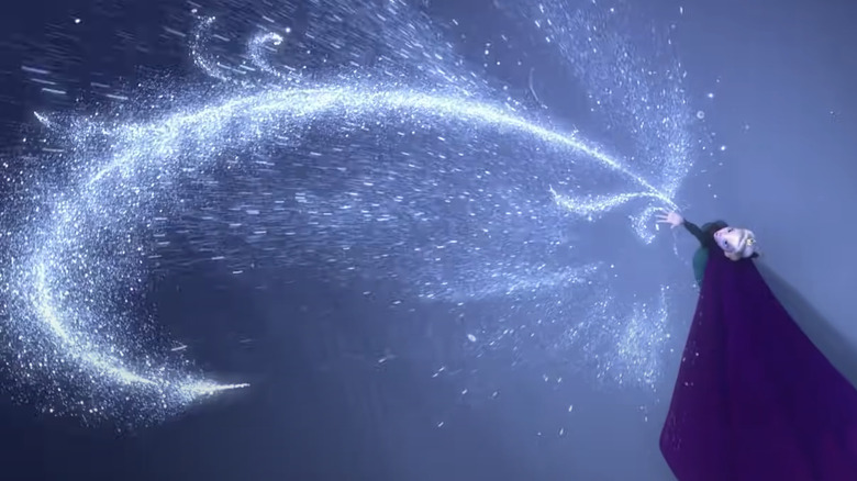 Queen Elsa using her magic