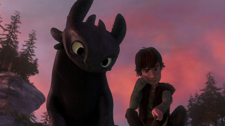 Hiccup and Toothless looking curiously