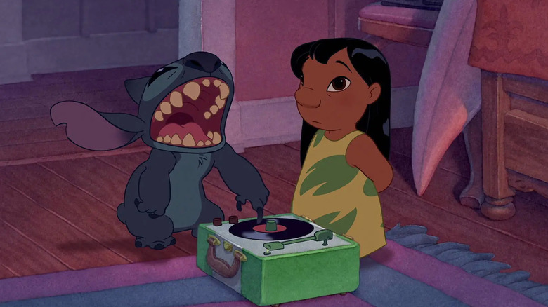 Lilo using Stitch to operate record player