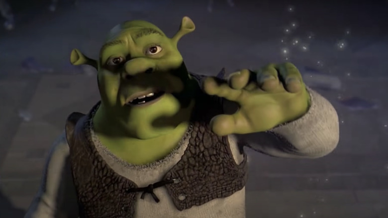 Shrek hand up to light