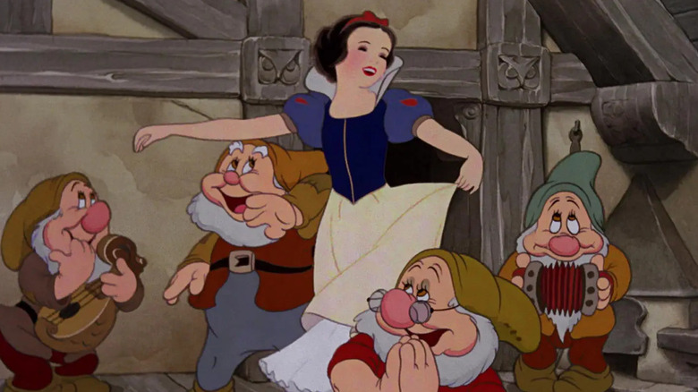 Snow White dancing with dwarfs