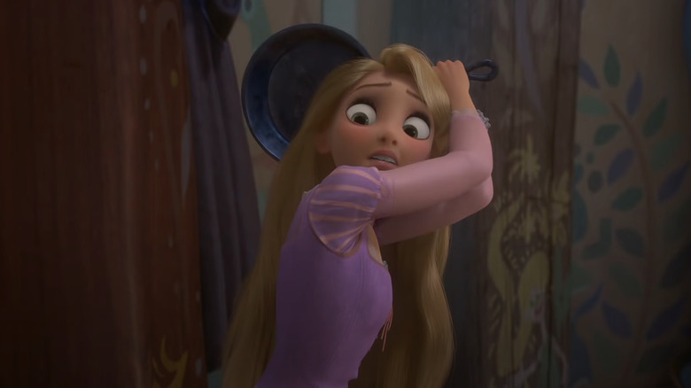 Rapunzel brandishing frying pan