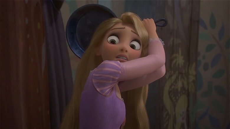 Rapunzel brandishing frying pan