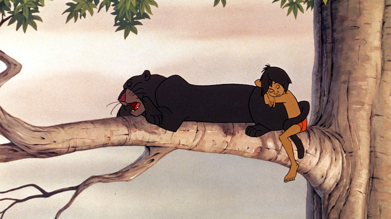 Mowgli napping in a tree with Bagheera