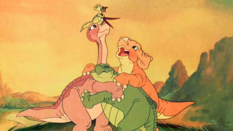 Littlefoot, Ducky, Petrie, Spike, and Cera group hug