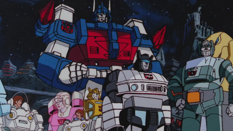 Transformers standing together smiling (1986)