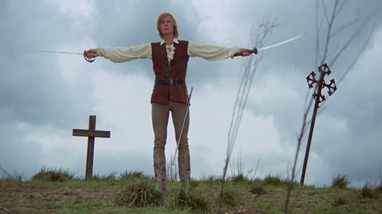 Captain Kronos holds swords