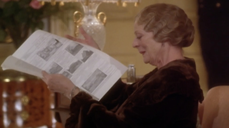 Maggie Smith reading newspaper