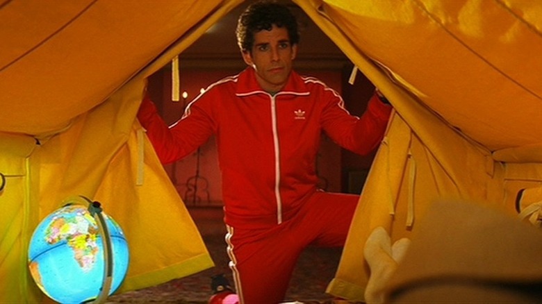 Chas  Tenenbaum opens tent flap