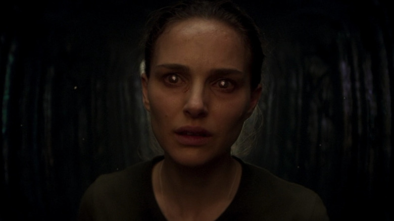 Natalie Portman stares ahead with glow in her eyes