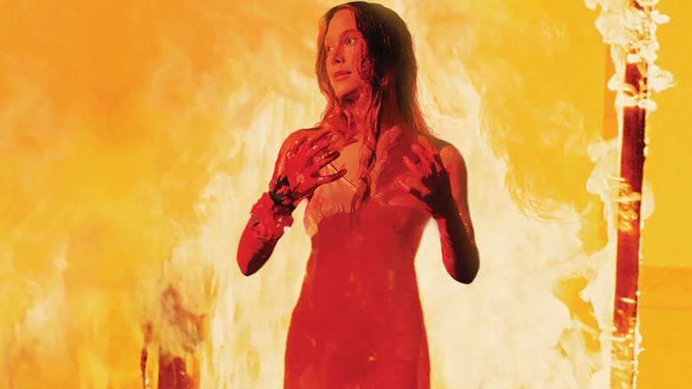 Bloody Sissy Spacek stands in fire