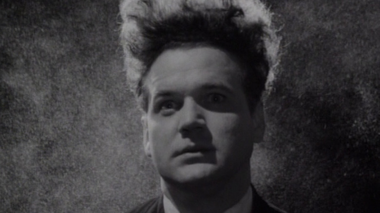 Jack Nance looks up surprised