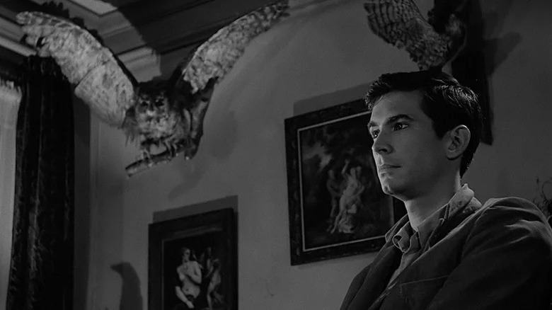 Anthony Perkins stares off to side