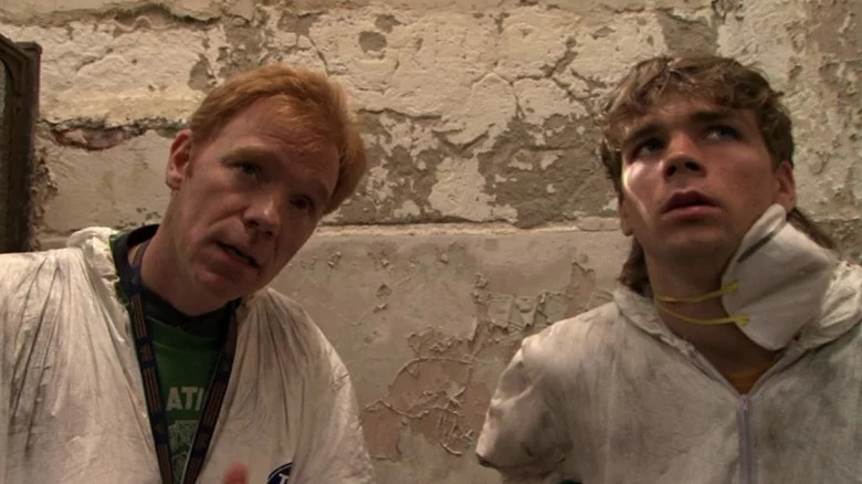 David Caruso and Brendan Sexton III look up at ceiling