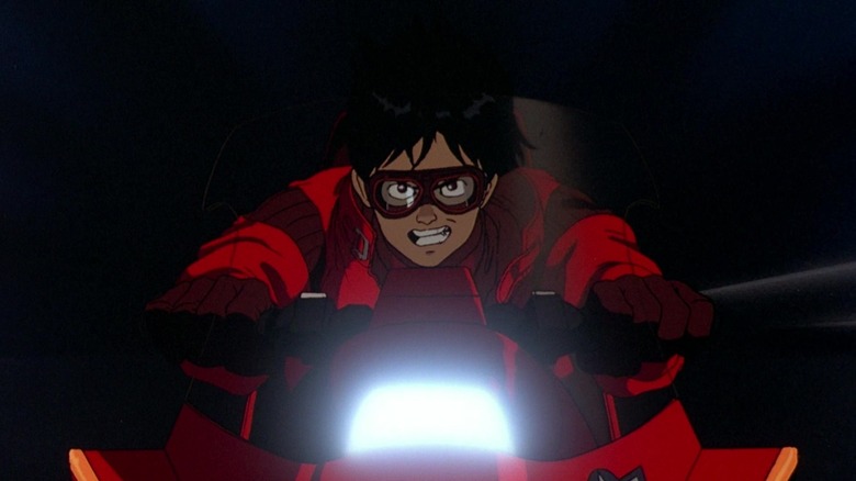 Kaneda drives his motorcycle