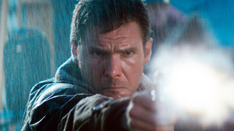 Rick Deckard fires at replicant