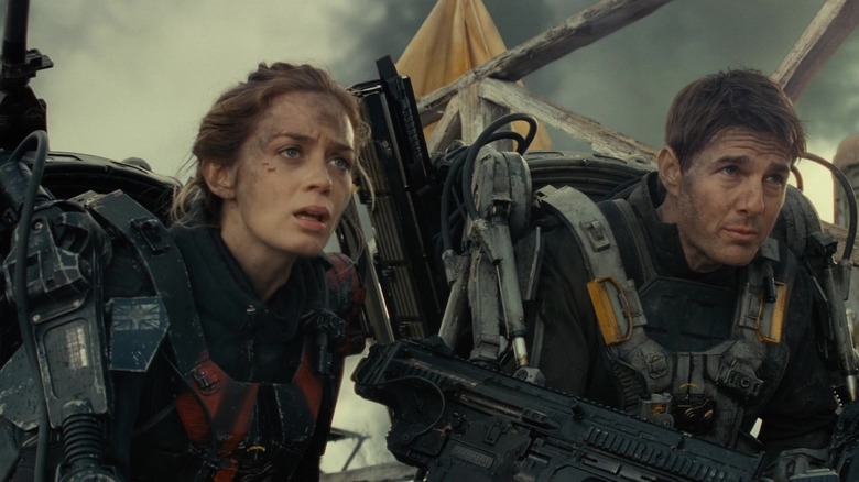 Rita Vratasky (Emily Blunt) and William Cage (Tom Cruise) in their armor in Edge of Tomorrow