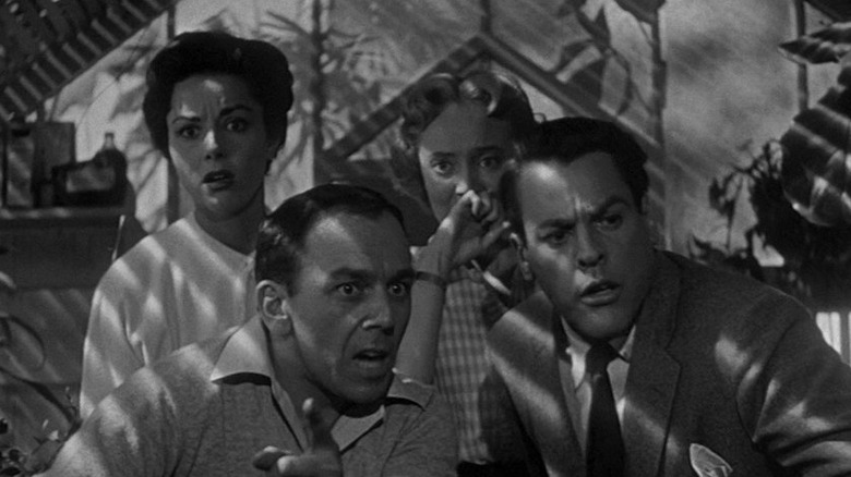 The cast of the original 1956 Invasion of the Body Snatchers when they find the alien pods