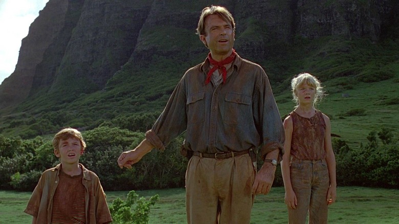 Lex (Ariana Richards), Alan (Sam Neill), and Tim (Joseph Mazzello) in Jurassic Park