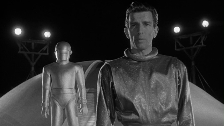 Gort and Klaatu in front of their spaceship