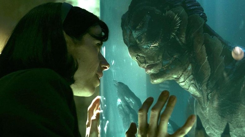 Elisa (Sally Hawkins) meets the Amphibian Man (Doug Jones) in The Shape of Water