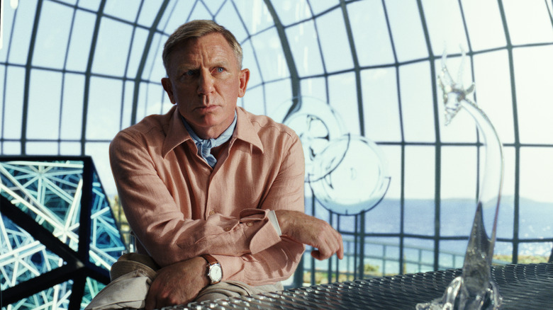 Daniel Craig listens intently