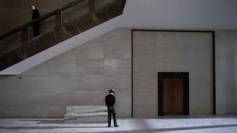 Wide shot of staircase in The Conformist