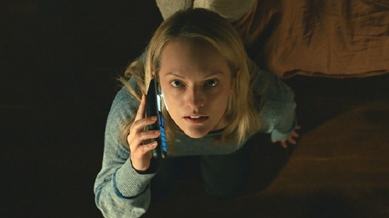 Elizabeth Moss on phone