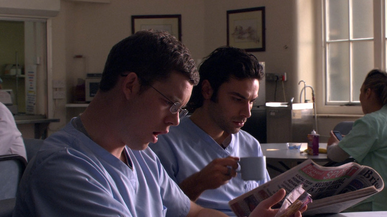 Tovey and Turner in scrubs