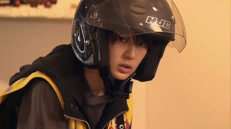 Eun-chan wearing motorcycle helmet