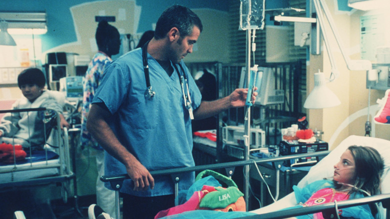 Doug Ross talking to child patient