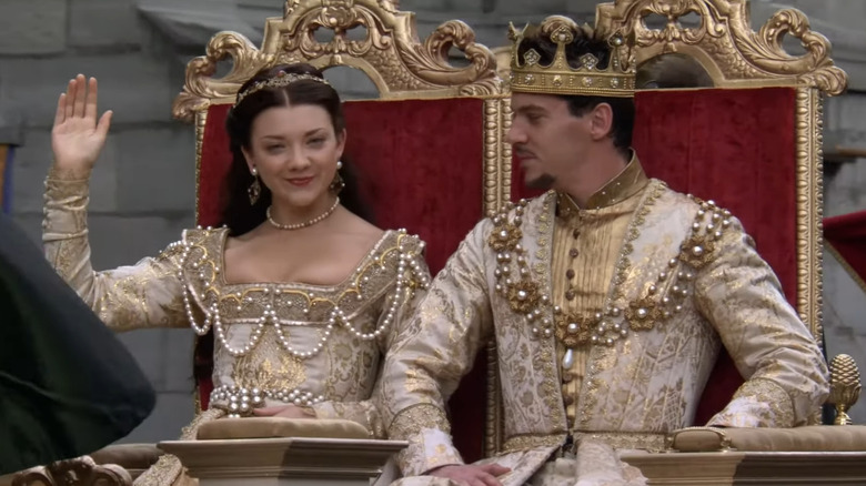 Henry VIII and Anne wave to crowd