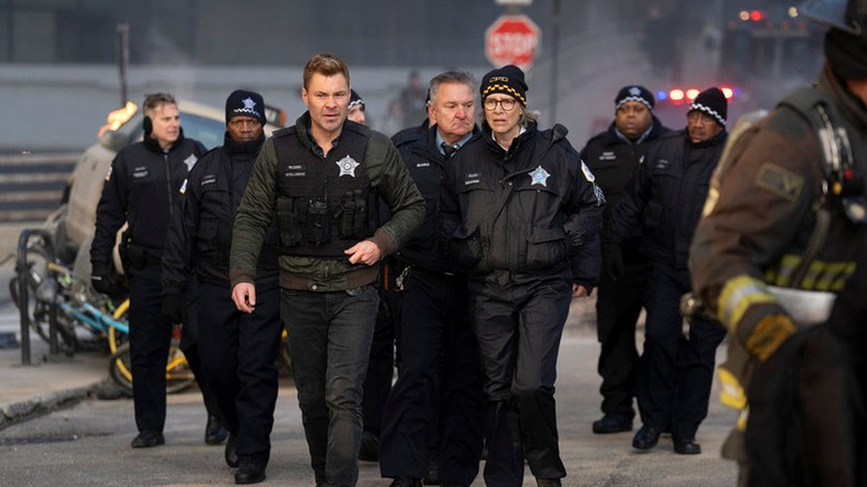 Ruzek walking with Platt outside in "Chicago Fire"