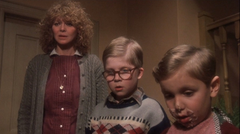 Mrs. Parker, Ralphie, and Randy looking at leg lamp