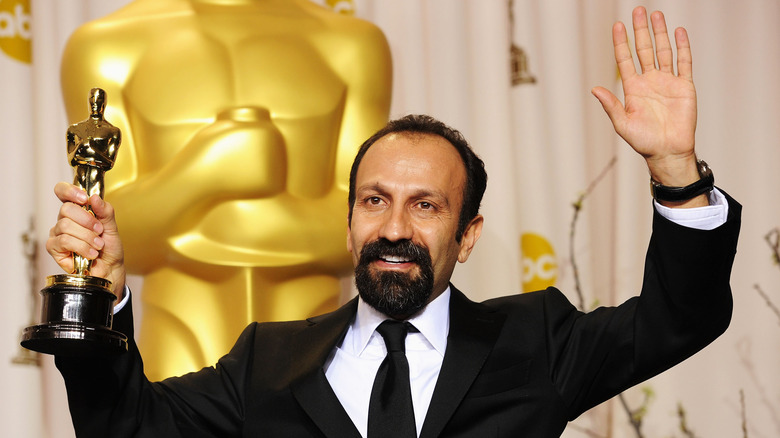 Asghar Farhadi celebrating his 2012 Oscar win