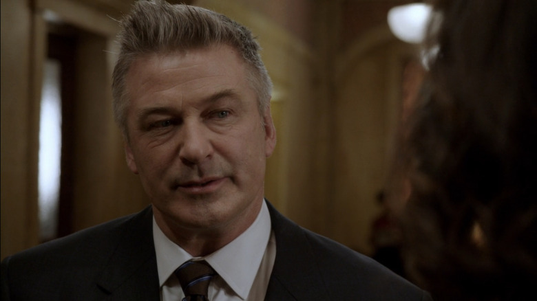 Alec Baldwin scoffs