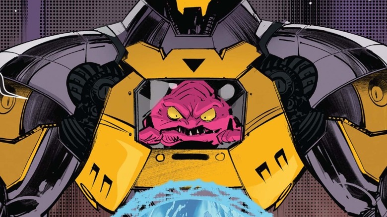 Krang in his usual armor watching a dimensional view of the rangers