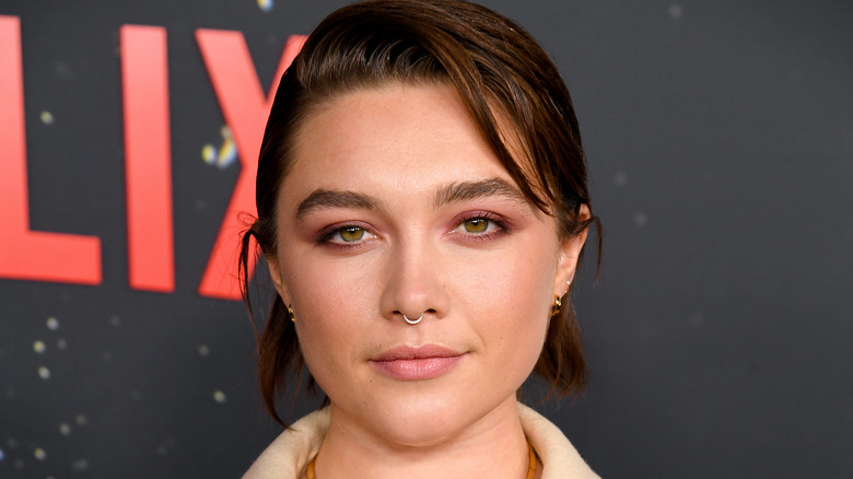 Florence Pugh short brown hair posing