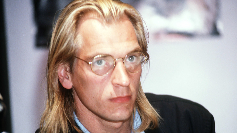 Julian Sands long hair glasses