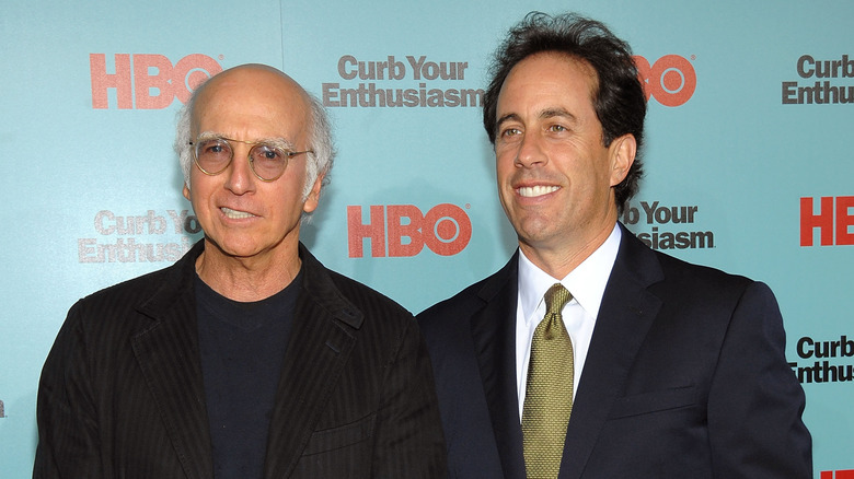 Larry David and Jerry Seinfeld smile