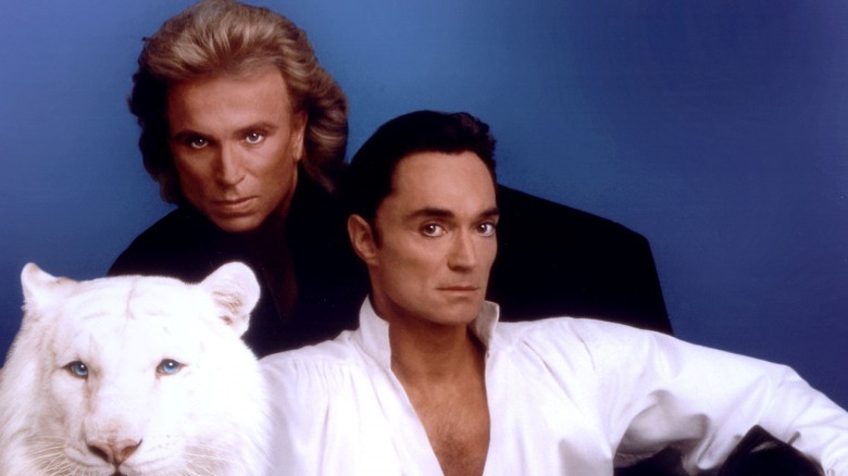 Siegfried and Roy with a tiger