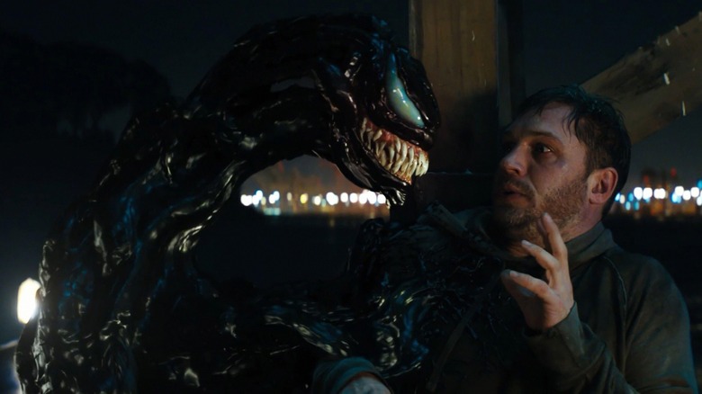 Venom terrorizing Eddie Brock